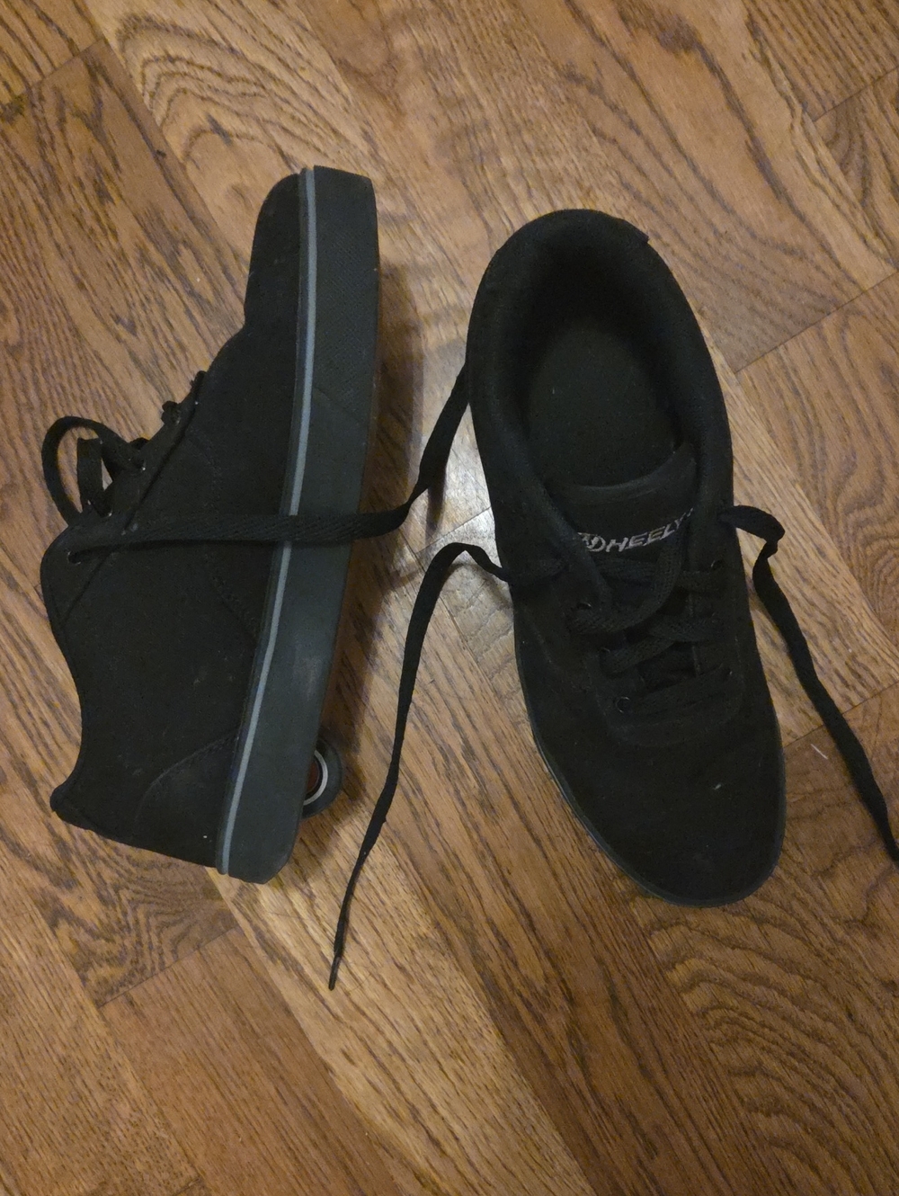Black Canvas HEELYS. Men's sz 10.